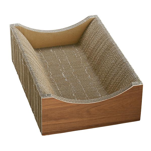 くつろげる爪とぎベッド　木目調 研ぎカスが散らばりにくい構造。内側の断面は波状カットだから安全です。